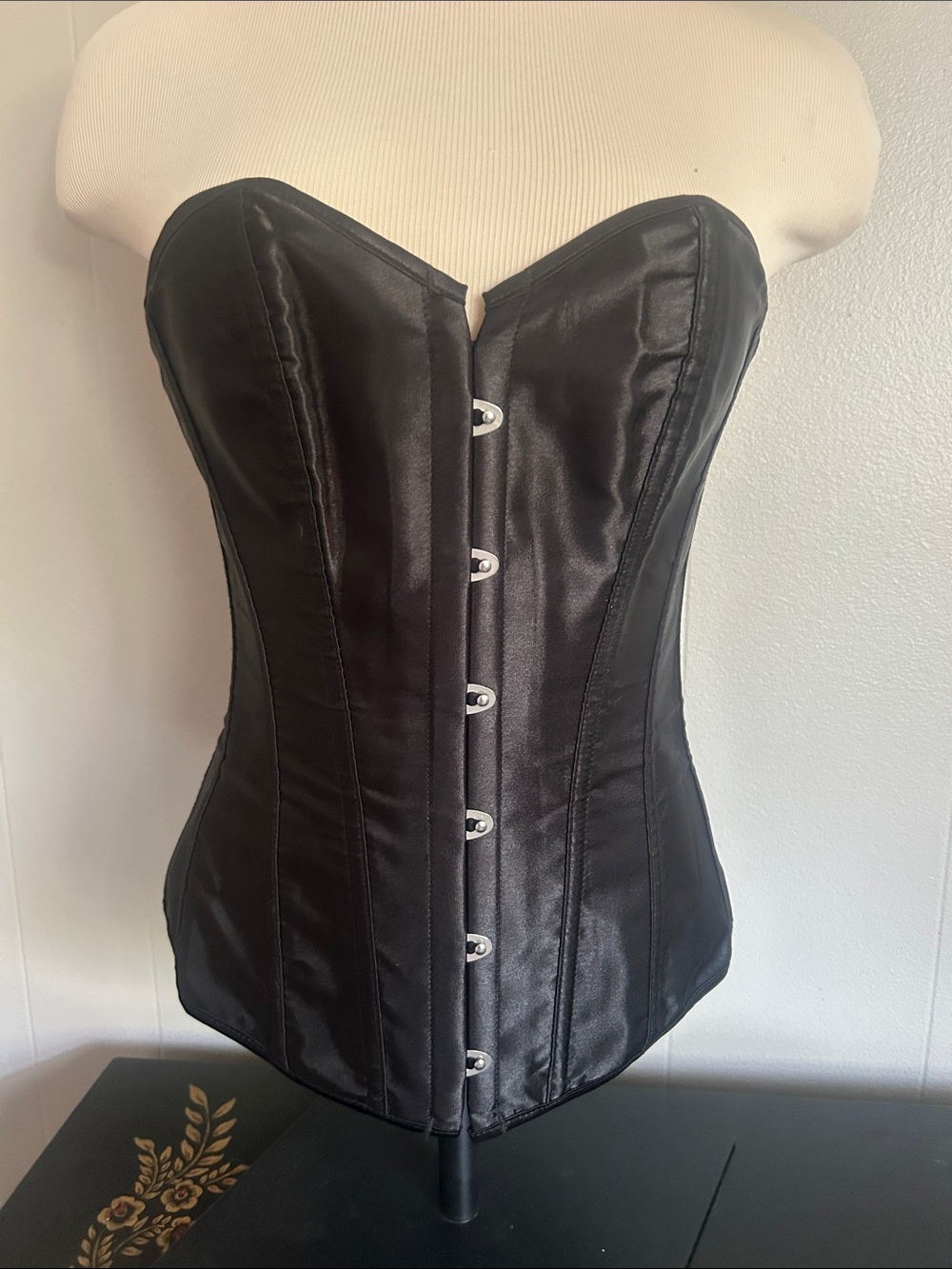 Elegant black satin corset with lace up back